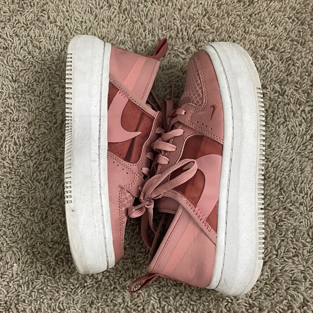 Pink Nike courts